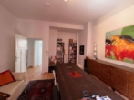 Wohnzimmer - Renoviert 2-Zimmer-Altbau-Wohnung am Elsässer Platz, 2 Balkone!