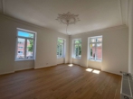 Wohnzimmer - Top sanierte Altbauwohnung für City-Liebhaber